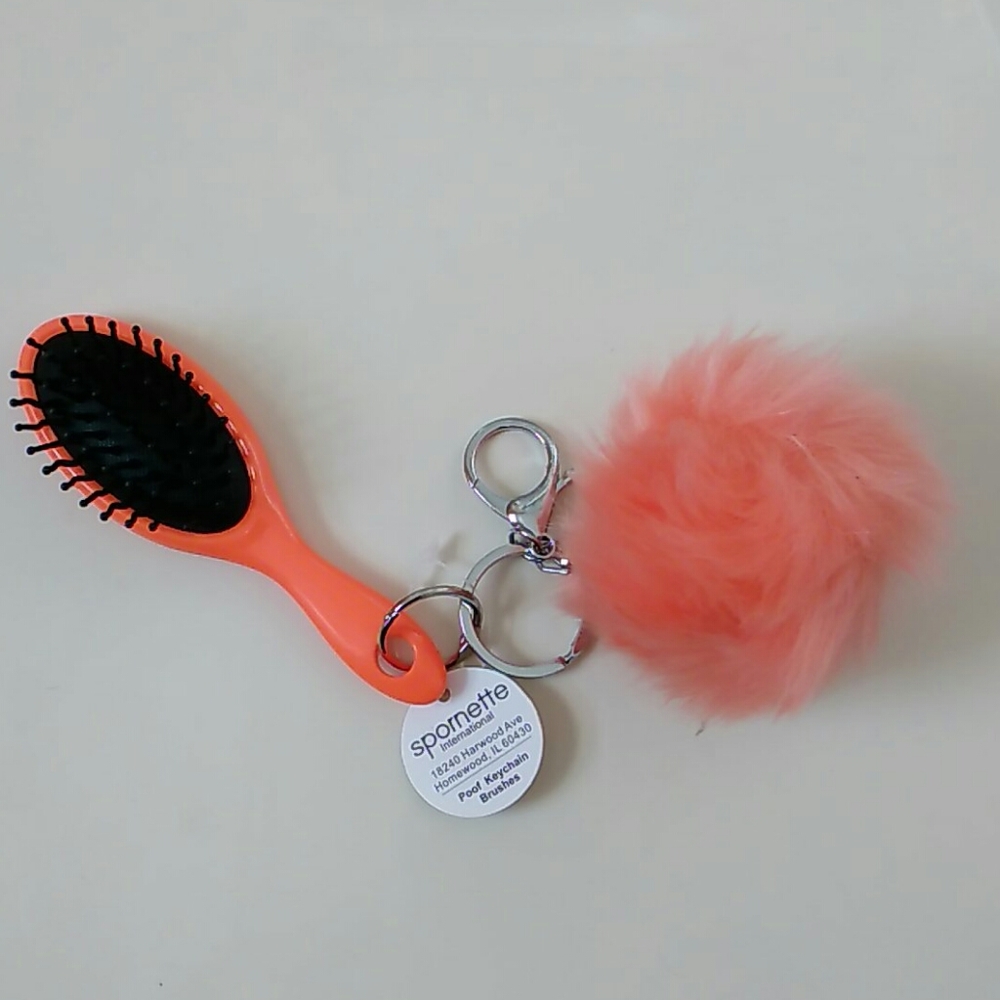 Spornette poof, keychain, brush